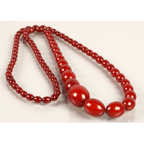 53 - Graduated string of cherry amber / resin bead necklace, approx. 53g