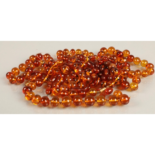 68 - Large assortment of amber /  resin beads, one necklace in tact