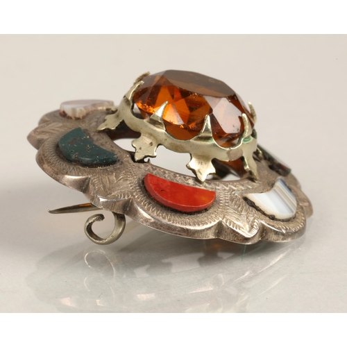 75 - White metal Scottish brooch set with agate, bloodstone, orange coloured central gem