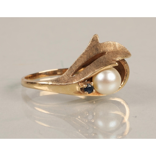 79 - 9ct gold ring set with a blue gem and a pearl, ring size L/M, 5g