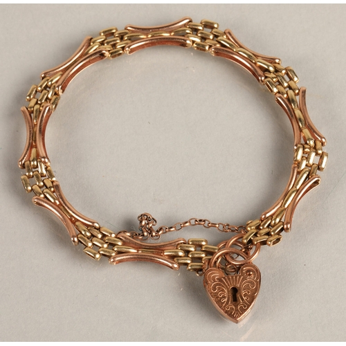 90 - 9ct rose and yellow gold bracelet with heart locket, 8g