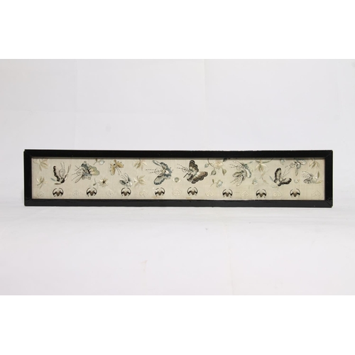 102 - Chinese needlework on silk sleeve panel in frame, 52cm x 10cm.