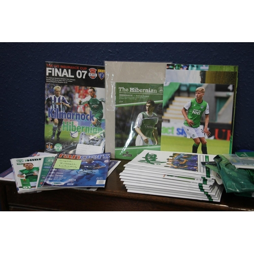 115 - Hibernian Football Club items to include a Home Shirt (4XL), pennants, programmes, etc.