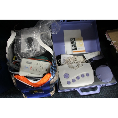 131 - Slim Gym toning machine and a bag containing medical equipment to include a stethoscope, etc.