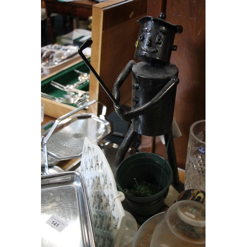 141 - Kitchenalia to include vintage Tower scales, a cast metal bookstand, also a tin man garden ornament ... 