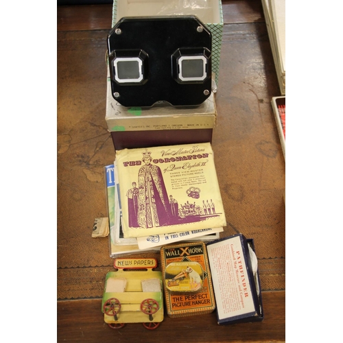 169 - Sawyers Viewmaster Stereoscopic Viewer with additional reels, a metal newspaper stand, two vintage t... 