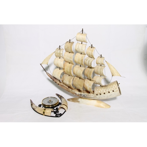 189 - Horn model of a five masted sailing ship, 51cm long, and a horn wall barometer.