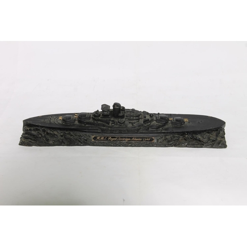 195 - Coal carved model of HMS Royal Sovereign Atlantic 1944 by Collier Row, 36cm long.