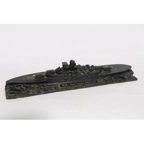 195 - Coal carved model of HMS Royal Sovereign Atlantic 1944 by Collier Row, 36cm long.