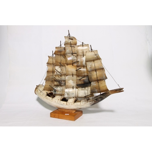 197 - Horn model of a five masted sailing ship, 54cm long.