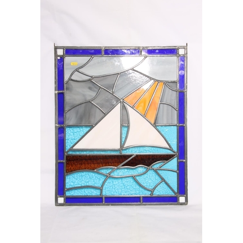 20 - Leaded glass window panel depicting a sailing ship, 58cm x 48cm.