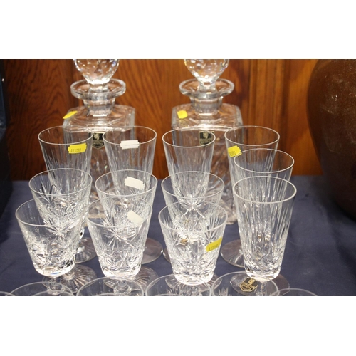 22 - Mixed suite of Edinburgh Crystal to include two square shaped decanters, six liqueur glasses, four t... 