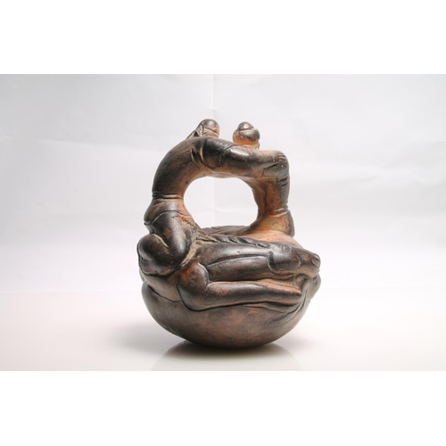 234 - Terracotta pottery figure of entwined oriental gentleman and horses, 18cm high.