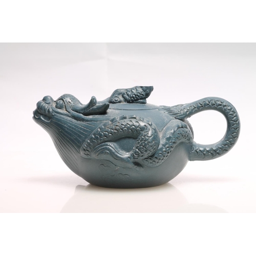 235 - Blue terracotta miniature teapot with seal mark to base, 16cm long.