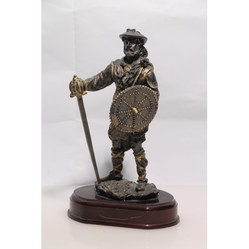 257 - Composite model of a Jacobite soldier with targe and basket hilt broadsword, 26cm high.