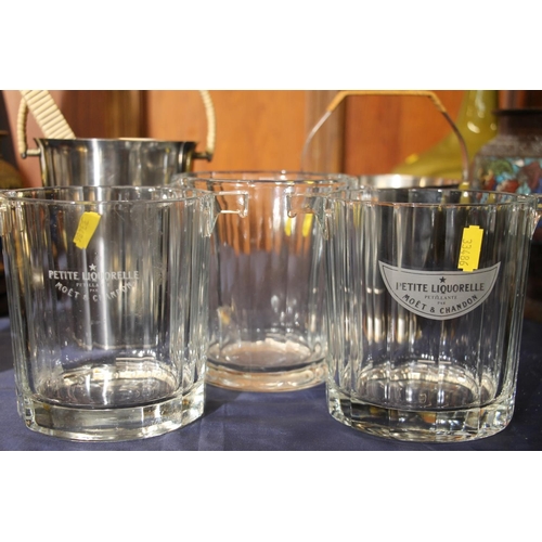 27 - Danish stainless steel pail, a similar ice bucket and three glass ice buckets to include Moet & ... 