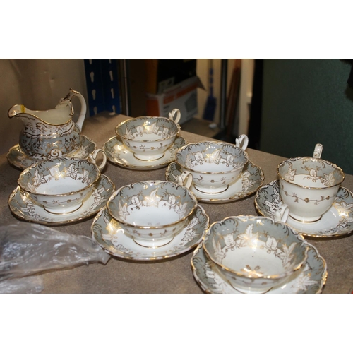 319 - Antique part service to include cups and saucers.