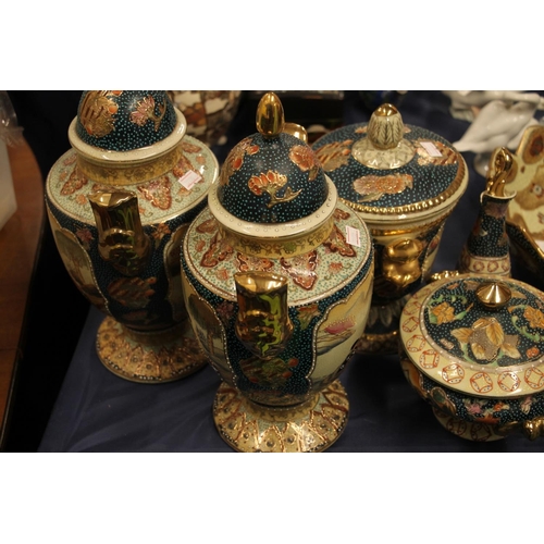 41 - Modern Japanese Satsuma style ceramics to include a pair of urns and covers, a lobed bowl, a ewer an... 