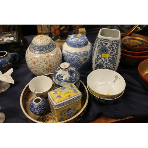 44 - Oriental ceramics to include two ginger jars and covers, rice bowls, a Satsuma style dish, a tea cad... 