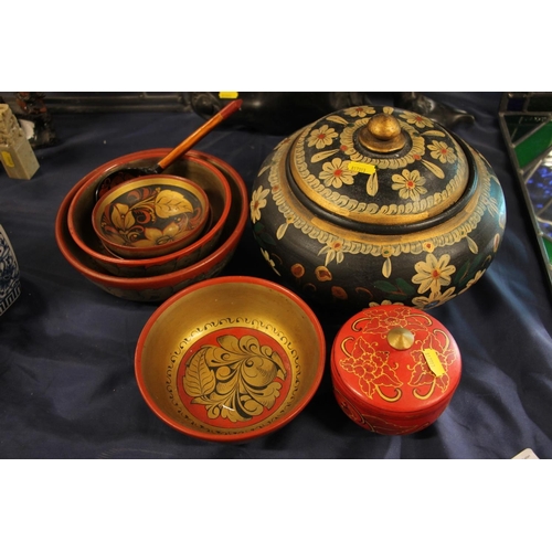 50 - Oriental painted lacquer ware to include bowls, lidded jars, a spoon, etc.