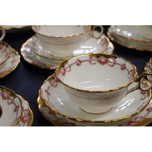 53 - Cauldon Ltd of England gilt floral decorated teaset.