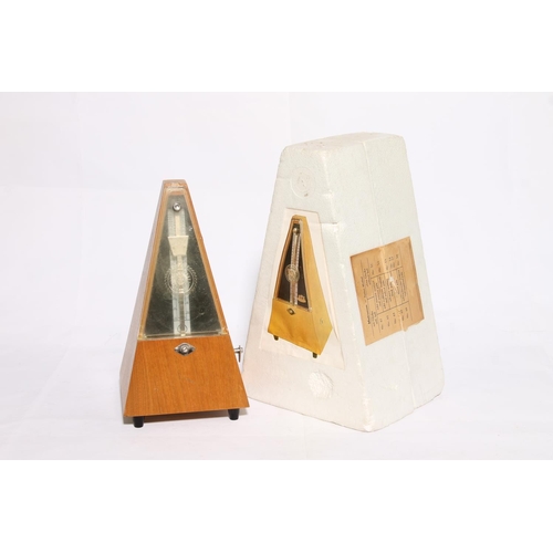 59 - Cased metronome.