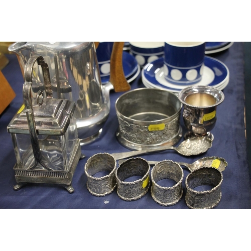 60 - Picquot ware coffee pot, and EP ware to include a wine slide, napkin rings, a preserve pot, etc.