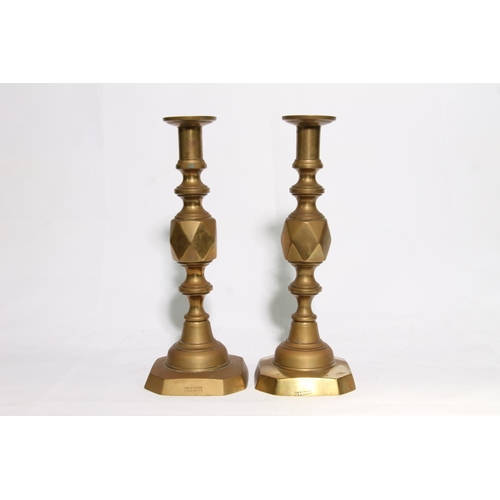 61 - Pair of King of Diamonds candlesticks, 32cm high.