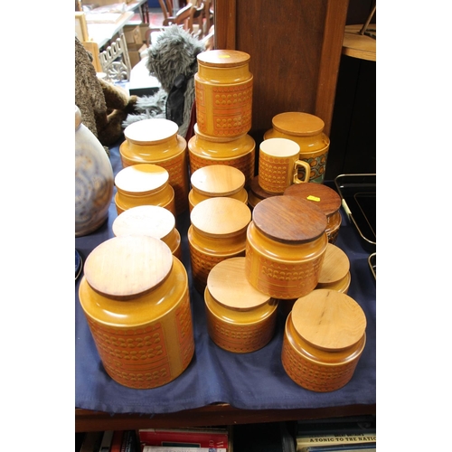 64 - Hornsea Saffron storage jars, an Heirloom storage jar and a Bronte storage jar.