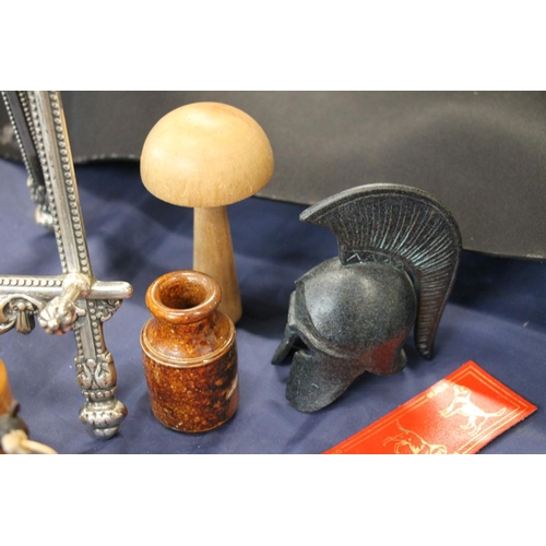 85 - Cast metal replica of a bronzed Roman helmet, a darning mushroom, an Art Metal limited edition figur... 