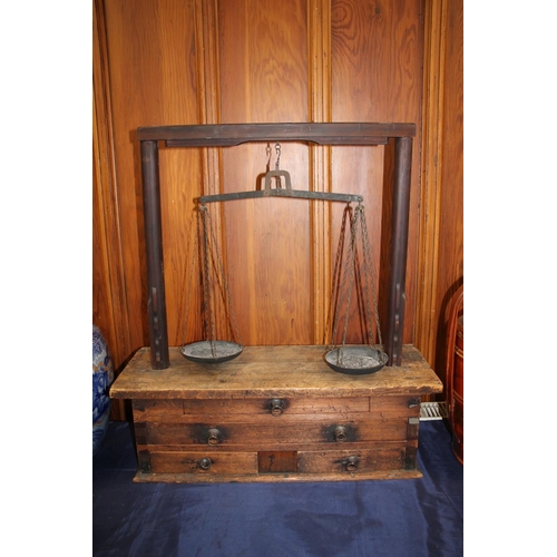 9 - Large set of Japanese balance scales on chest base, 80cm high.