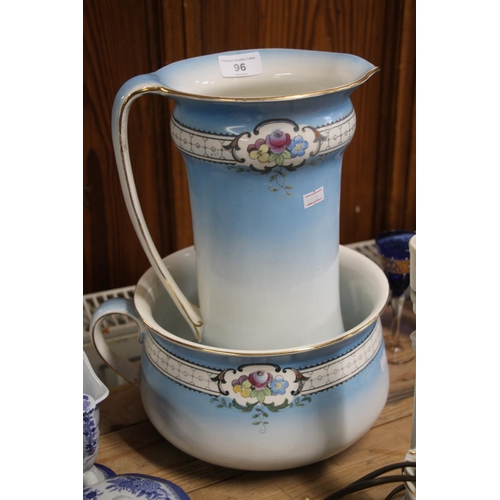 96 - Early 20th century wash ewer and matching chamber pot with blue glaze and floral decoration.