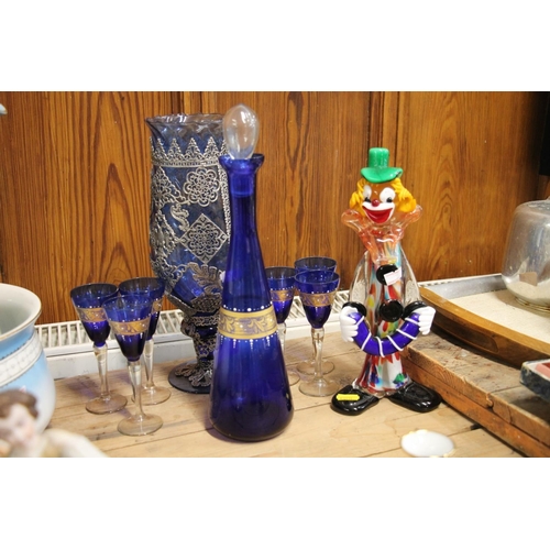 99 - Moser style Bristol blue and gilt decorated glass decanter and six matching glasses, a white metal m... 