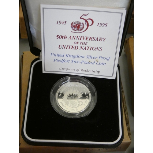 265 - United Kingdom. The Royal Mint proof sets to include many silver examples comprising of a 1997 Delux... 