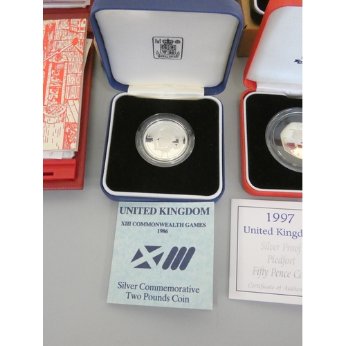 265 - United Kingdom. The Royal Mint proof sets to include many silver examples comprising of a 1997 Delux... 