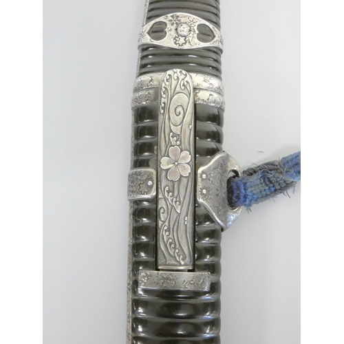 340 - Antique 19th century Japanese ceremonial Tanto. The scabbard of ridged buffalo horn construction wit... 