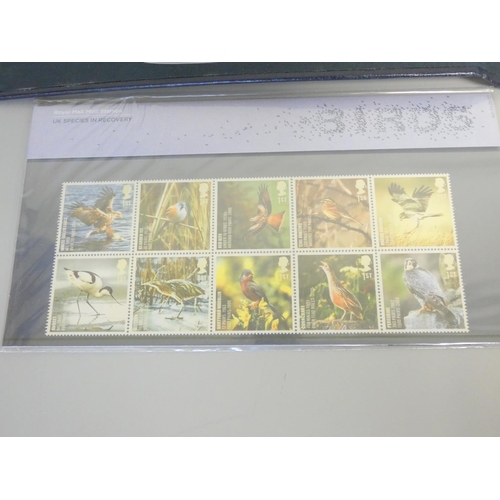 360 - Large collection of c1990s-2000s British mint presentation packs postage stamp sets comprising of 18... 