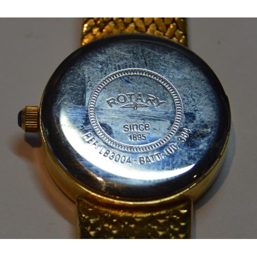 189 - Rotary lady's rolled gold quartz wristwatch, with white circular dial, baton indices and date window... 