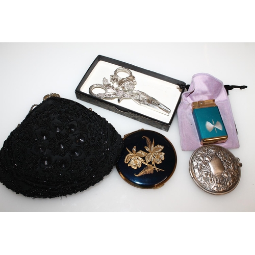 459 - Midwifes stork scissors, two compacts, lighter and beaded evening purse