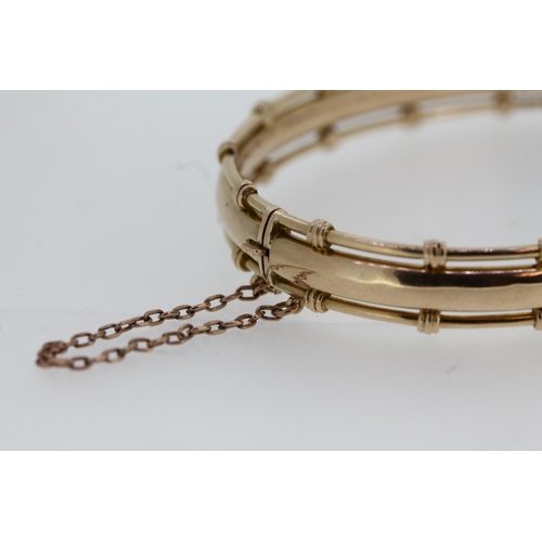 472 - Edwardian 15ct gold bangle, internal max W6cm, 11.8g.