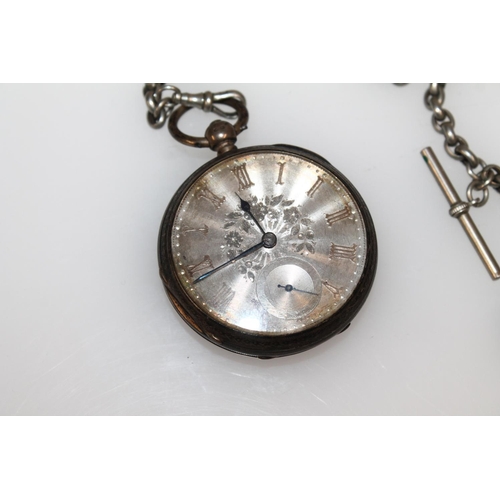 610 - Victorian silver cased open face key wind pocket watch with engraved dial, on white metal albert cha... 