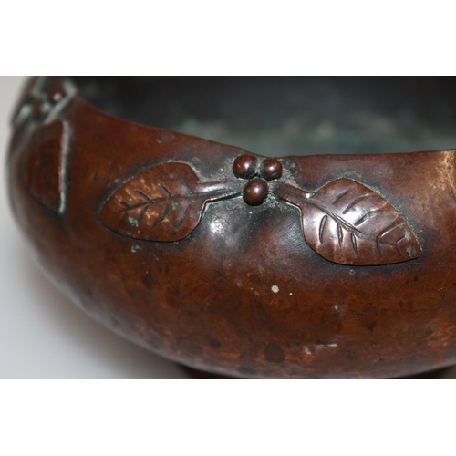 616 - Arts & Crafts hammered copper bowl with relief holly decoration, probably by Rita Ferguson, 16cm... 