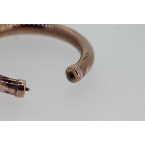 543 - Rose gold earring (A/F), tests as 9ct, 1.0g.