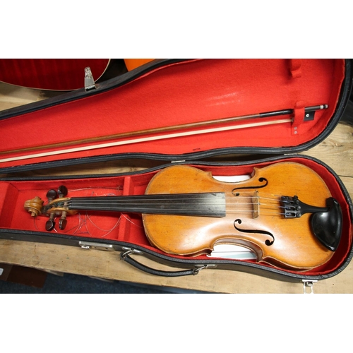 396 - Antique violin in hard case and bow.