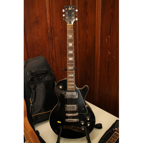 407 - Six string black electric guitar.