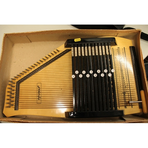 409 - Hopf 12 bar autoharp in box.