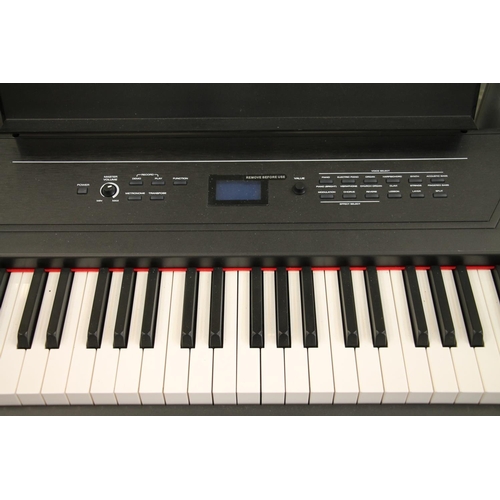 439 - Alesis Recital Pro electric keyboard on stand.