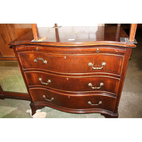 745 - Mahogany serpentine chest of three drawers, 77cm high.