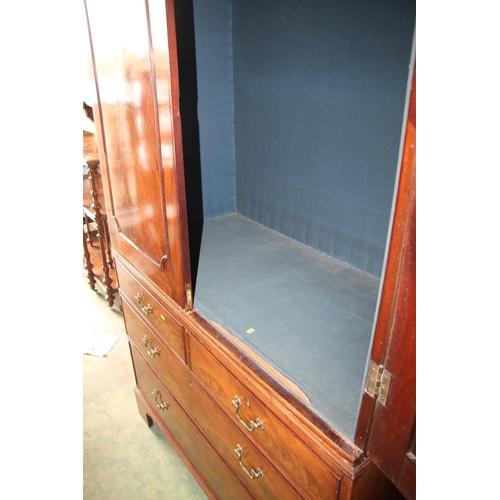 767 - 19th century mahogany wardrobe, over a chest of two short over two long drawers.