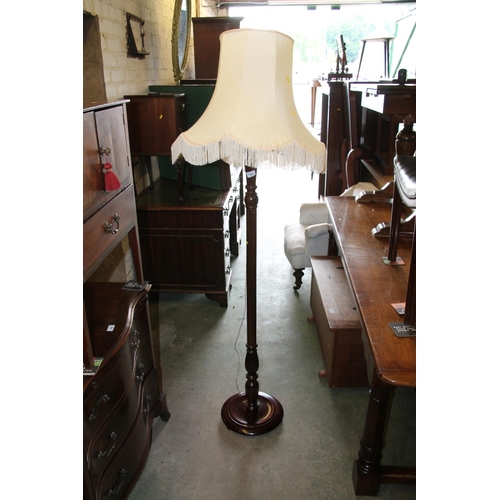 785 - Mahogany standard lamp.